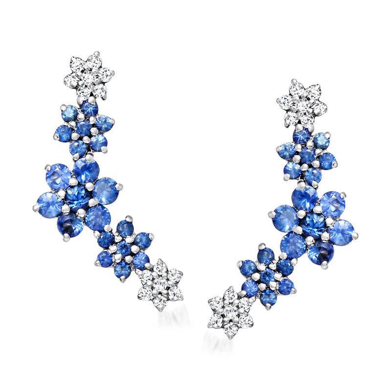 14kt white gold ear climbers with blue sapphire floral clusters and diamond accents