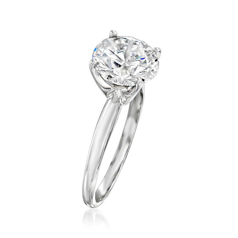 14kt white gold lab-grown solitaire ring, round diamond center on slender band, side view