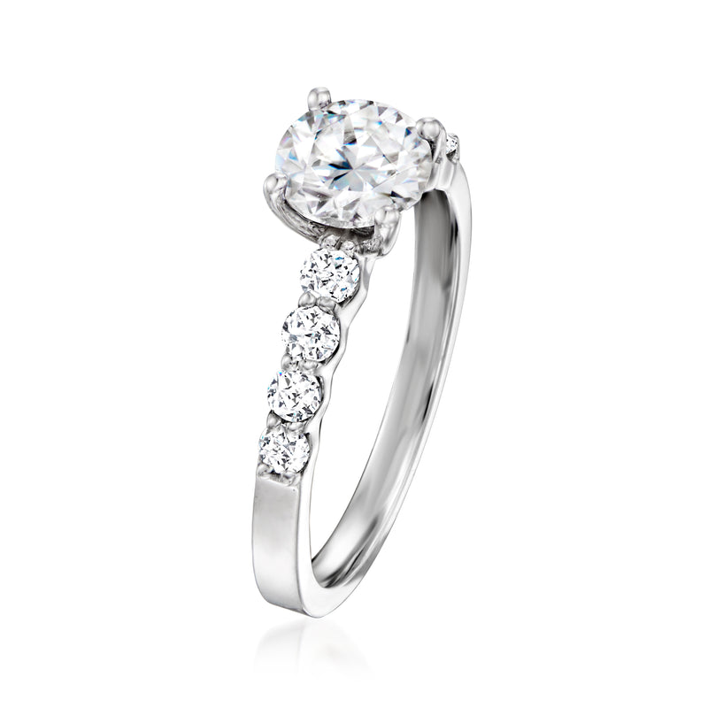 14kt white gold ring with round center diamond and three small round diamonds