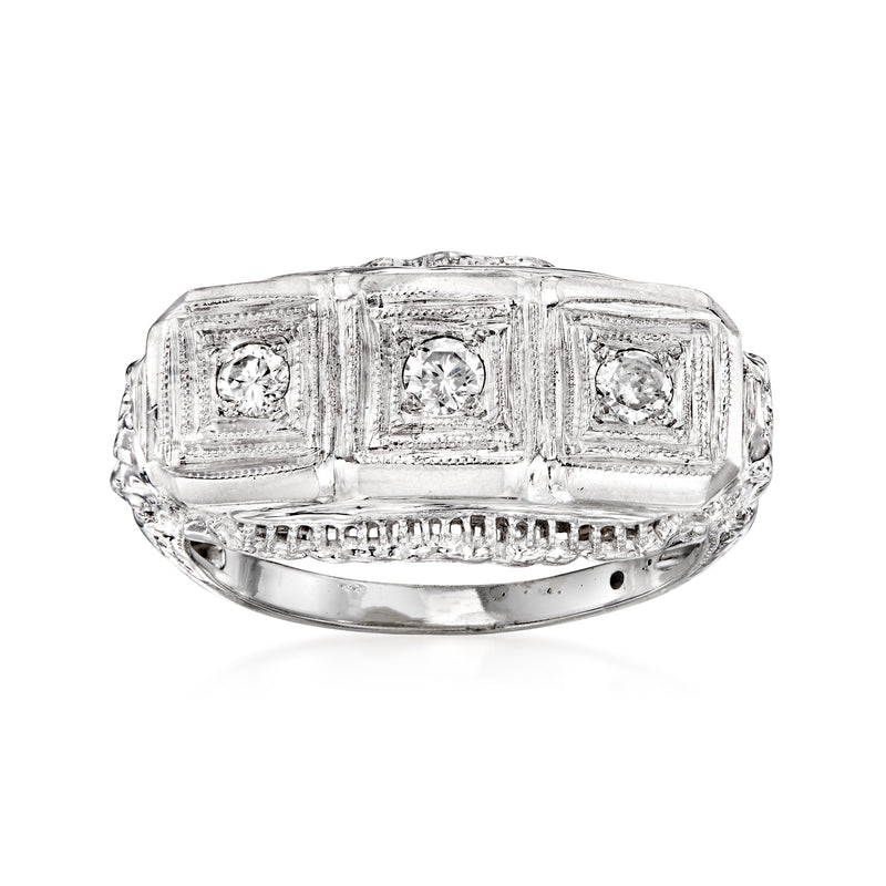 Vintage white gold diamond filigree ring with three round stones in square settings