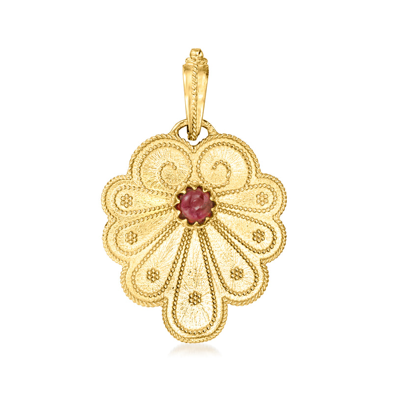 14kt yellow gold floral garnet pendant with detailed filigree and round red stone