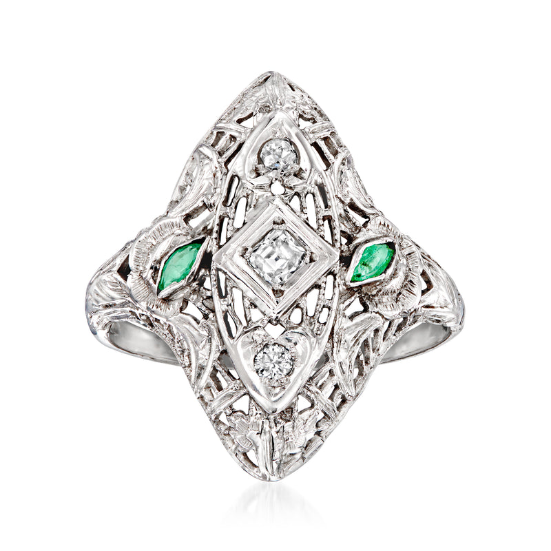 Vintage white gold diamond dinner ring with green emerald accents, openwork filigree and stone