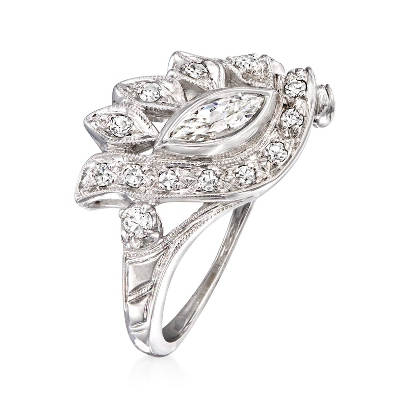 14kt white gold cluster ring with marquise center stone and surrounding round diamonds