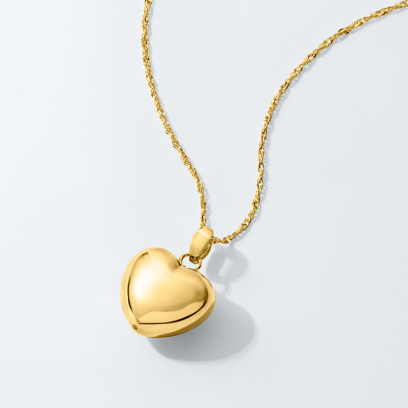 Gold-tone puffed heart pendant necklace on chain, small round bail