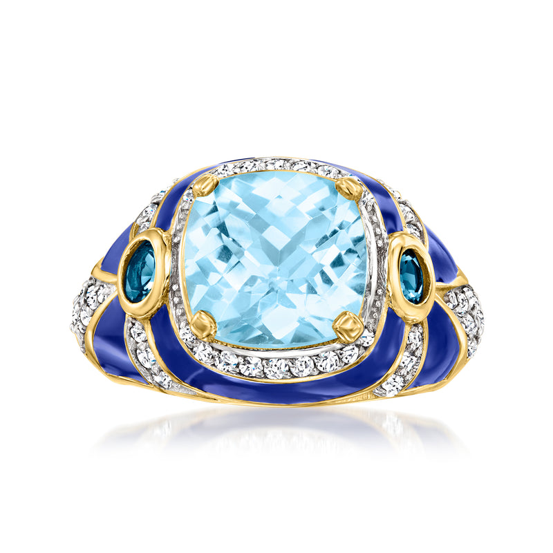 Gold-tone ring with large light-blue gemstone, blue enamel accents, and clear stone halo