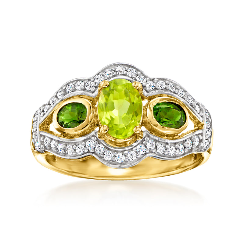 Gold over sterling ring with oval green peridot center and white zircon accents