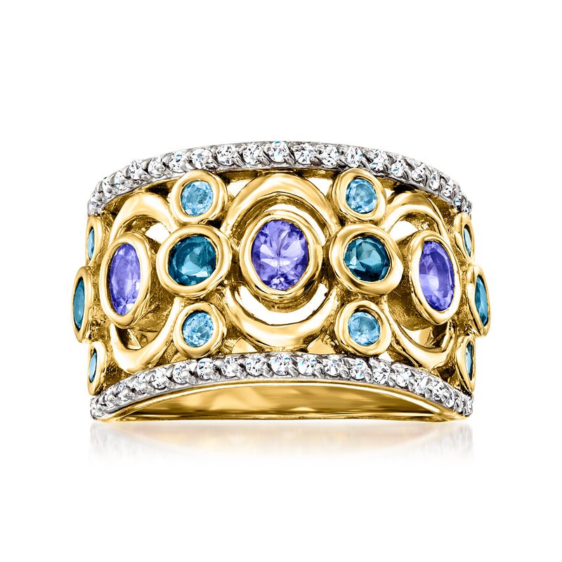 Two-tone gold gemstone ring with oval blue stones, purple accents, and clear halo trim