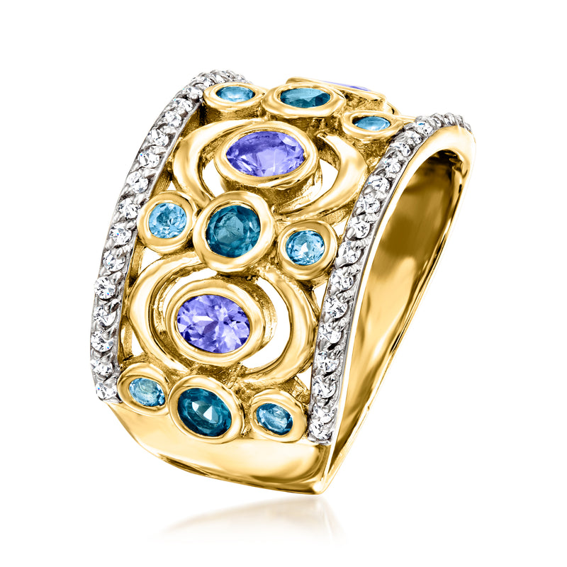 Gold square-set gemstone ring with oval blue and lavender stones, surrounded by clear accents