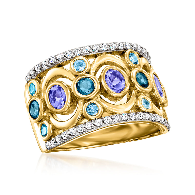 Gold gemstone ring with purple oval center stone, blue side stones, and clear border