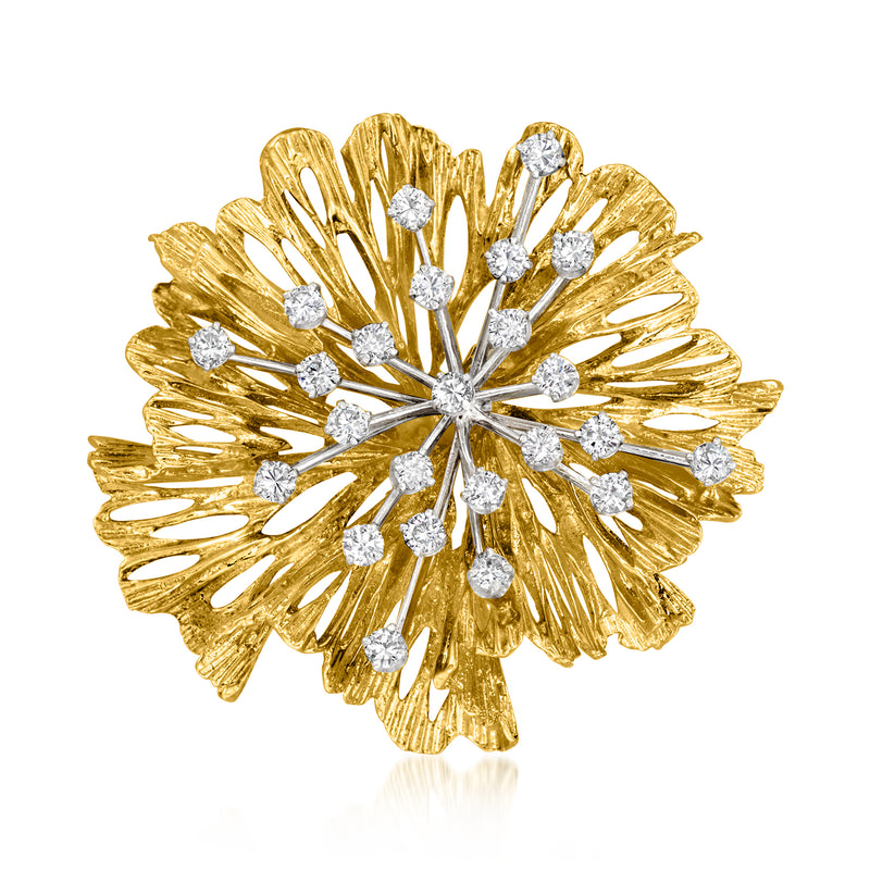 Gold diamond floral pin with central round diamonds and white metal accents, prong set
