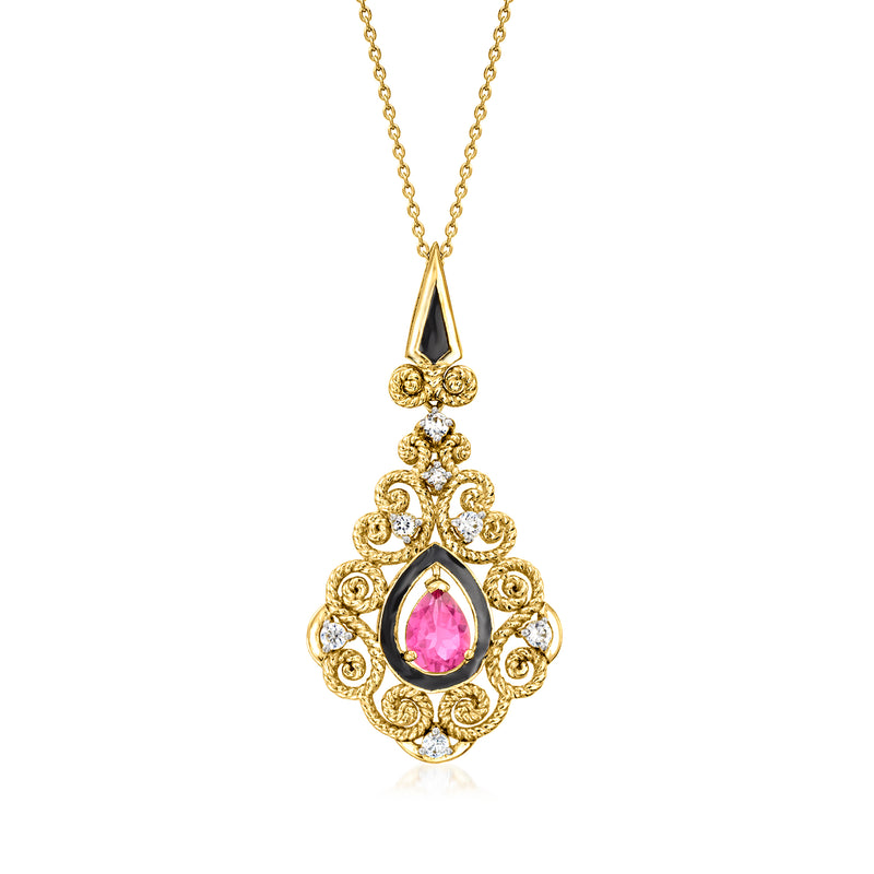 Gold pendant necklace with scrollwork, pink center stone, black enamel accents