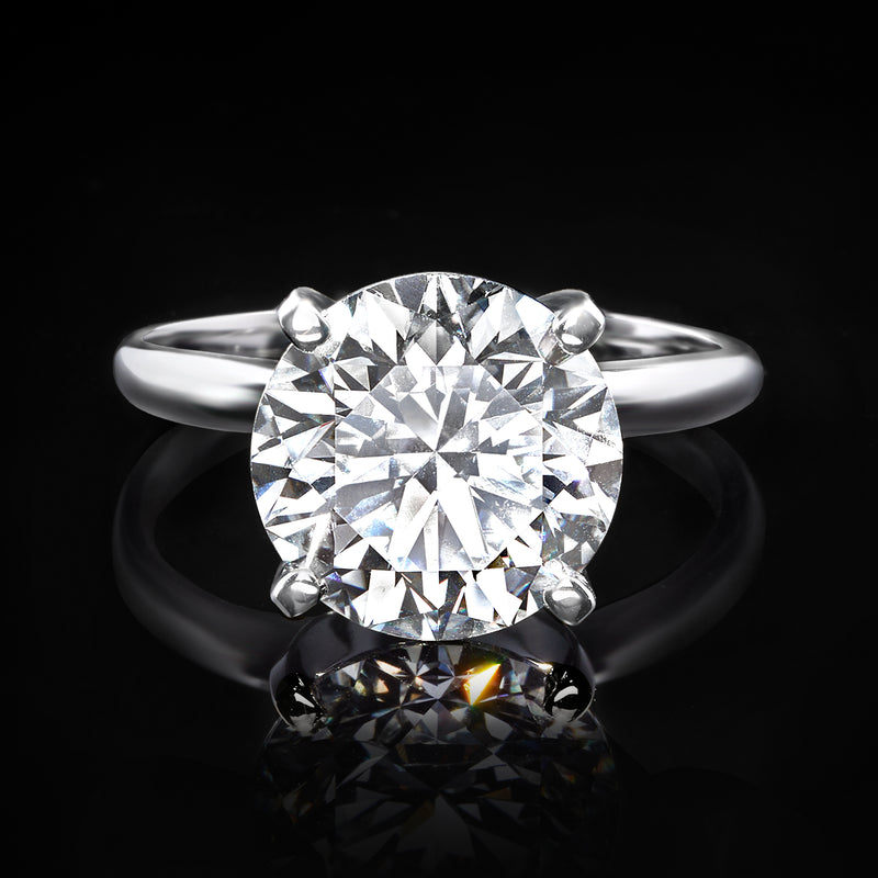 Round diamond solitaire ring in white gold with multi-prong setting, front view