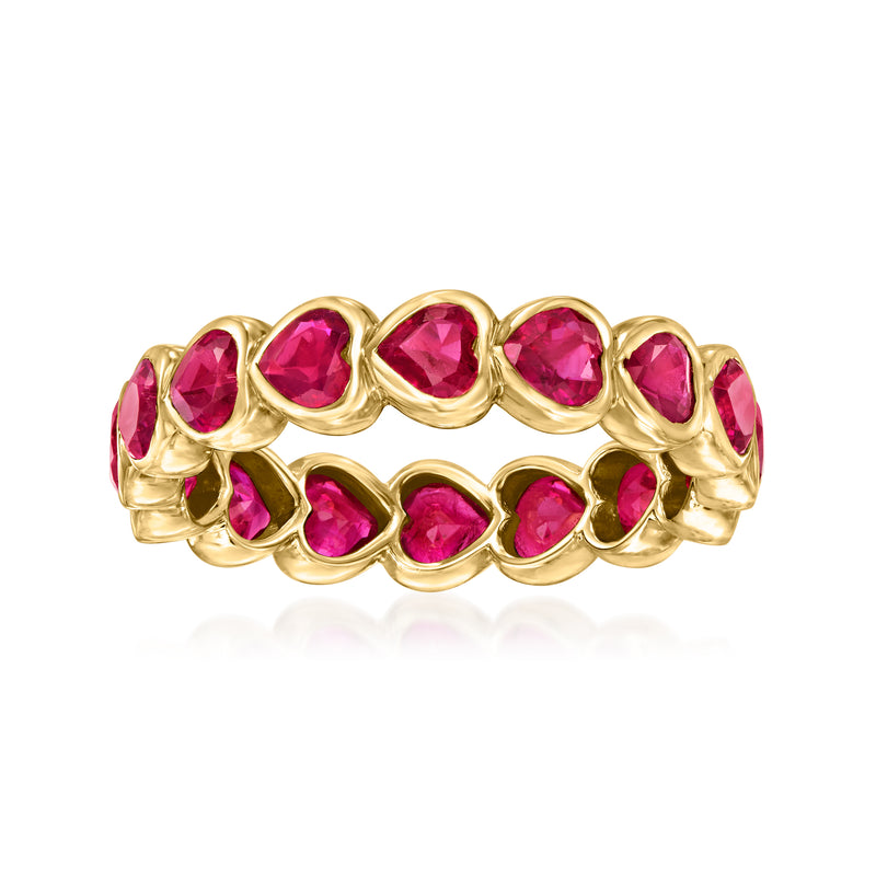 14kt yellow gold eternity band with heart-shaped ruby stones in prong settings