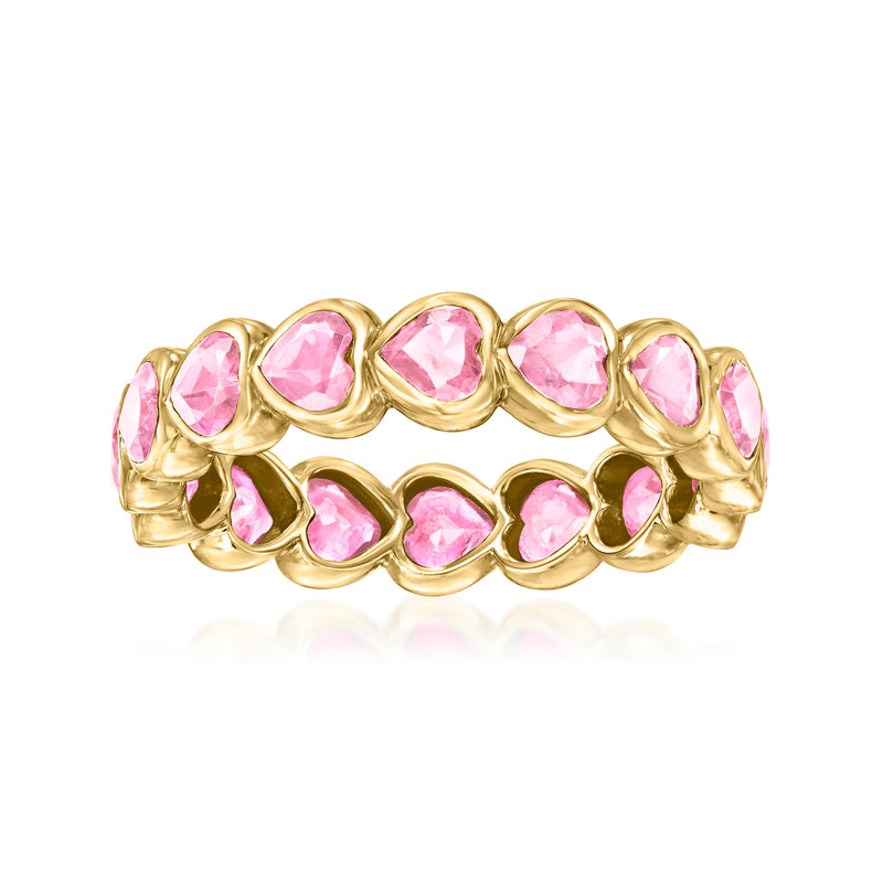 Yellow gold eternity band with pink heart-shaped gemstones