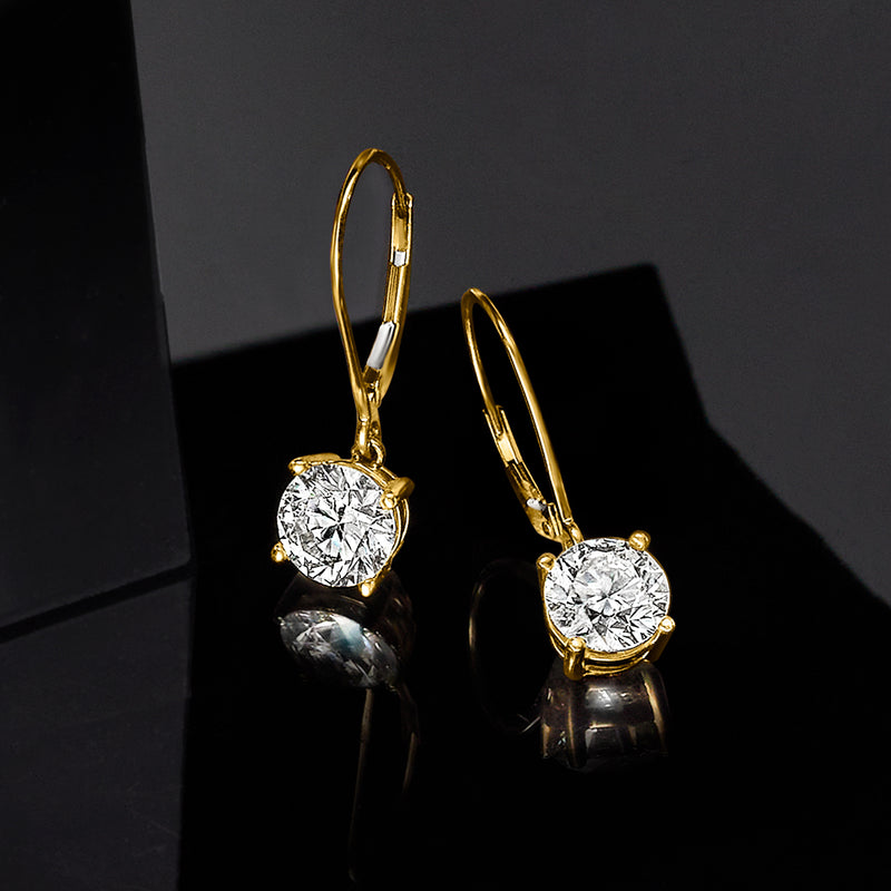 Yellow gold leverback drop earrings with round diamond center, side profile