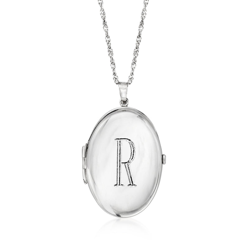 Sterling silver oval locket necklace with initial “R” on the front and chain links