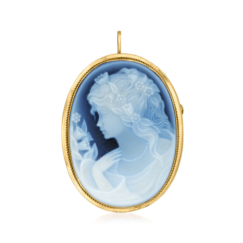 Blue cameo pendant with left-facing profile in 14kt yellow gold oval bezel, bail top