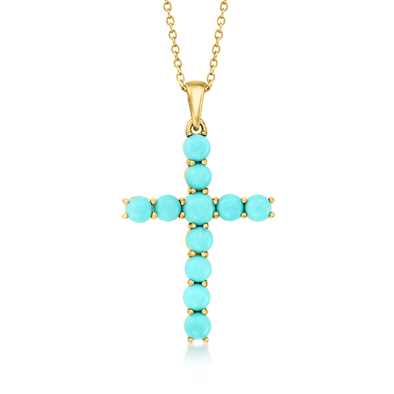 Gold cross pendant necklace with turquoise bead accents and fine chain