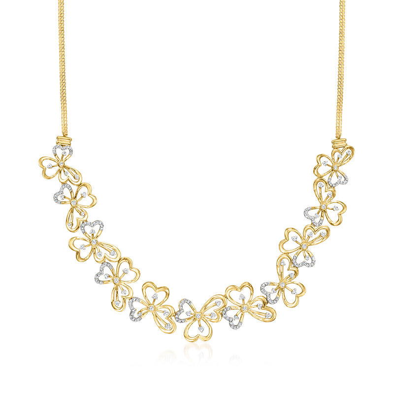 Gold-tone floral diamond necklace with linked clover flower motifs and sparkle accents