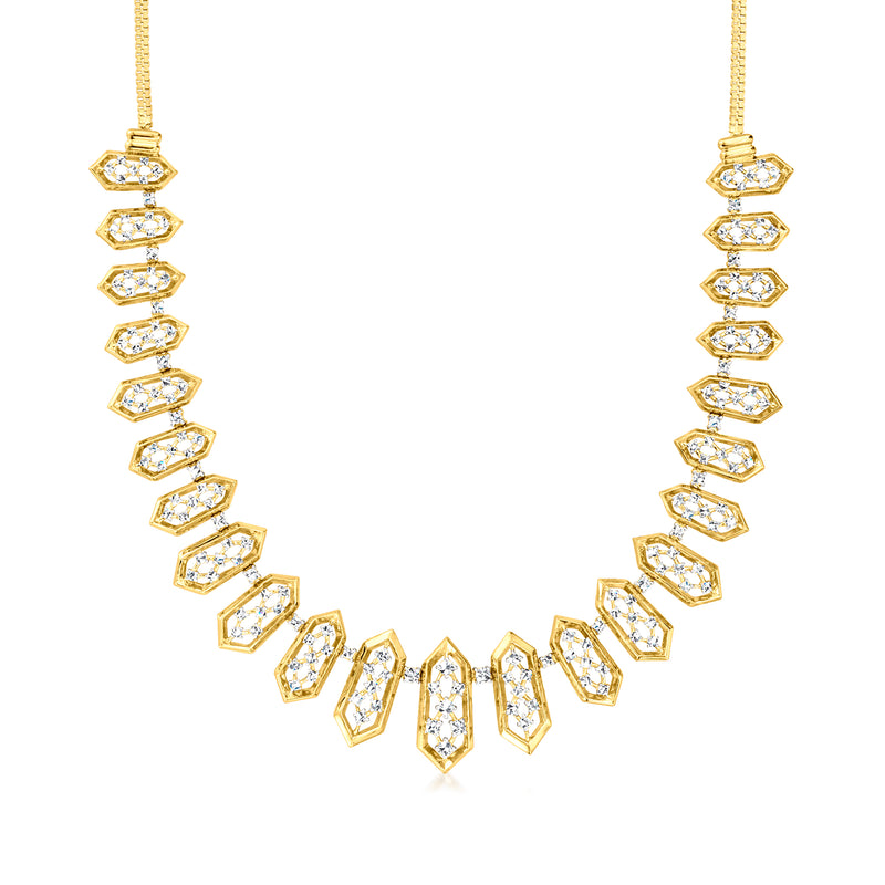Gold-tone geometric tennis necklace with oval diamond-look stones, linked by small settings
