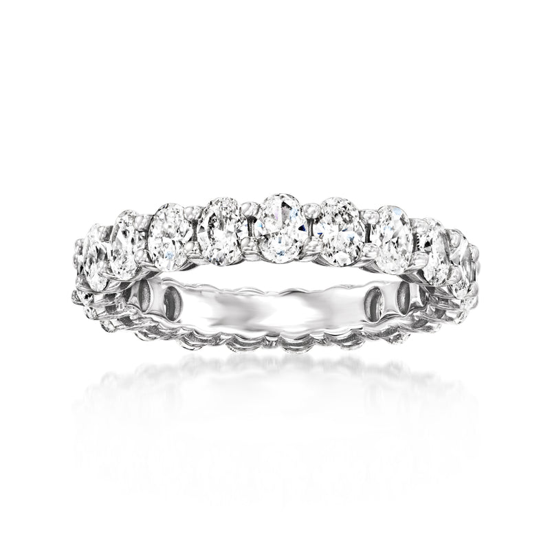 14kt white gold oval diamond eternity band with continuous sparkle row.