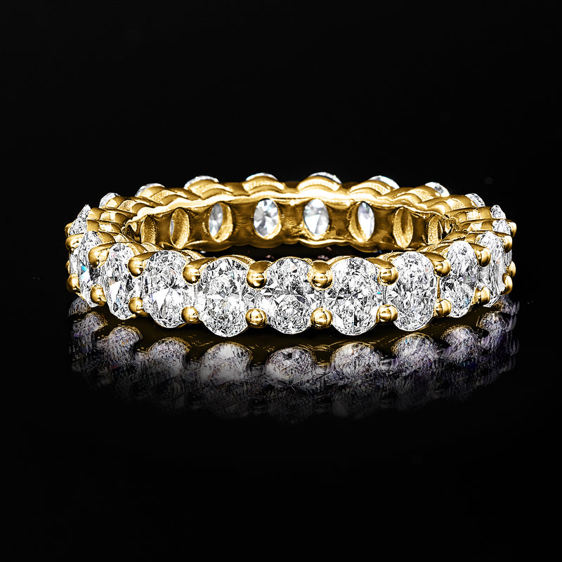 14kt yellow gold oval diamond eternity band, close-up top view with raised rows