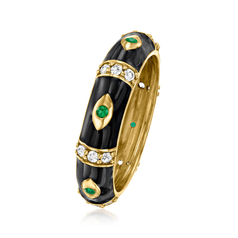 Gold evil eye ring with black enamel, green round stones, and small clear accents