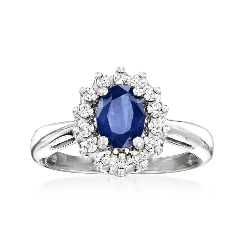 14kt white gold vintage ring with blue sapphire center and diamond halo