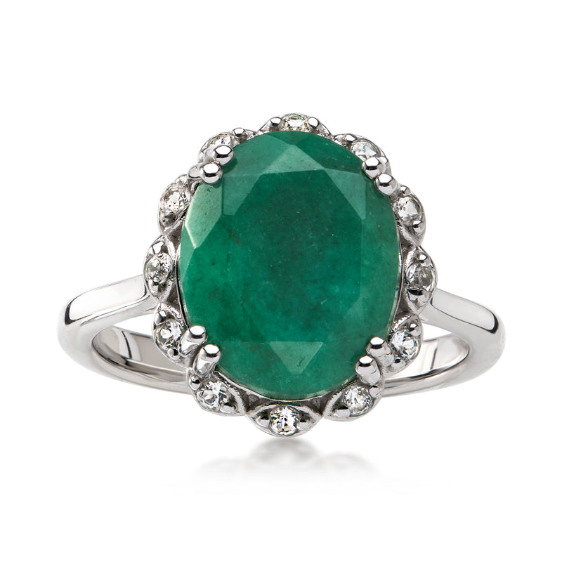 Sterling silver ring with oval green gemstone and white topaz halo