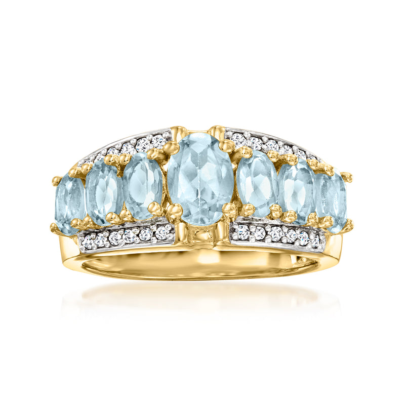 18kt gold ring with three oval aquamarine gemstones and diamond accents