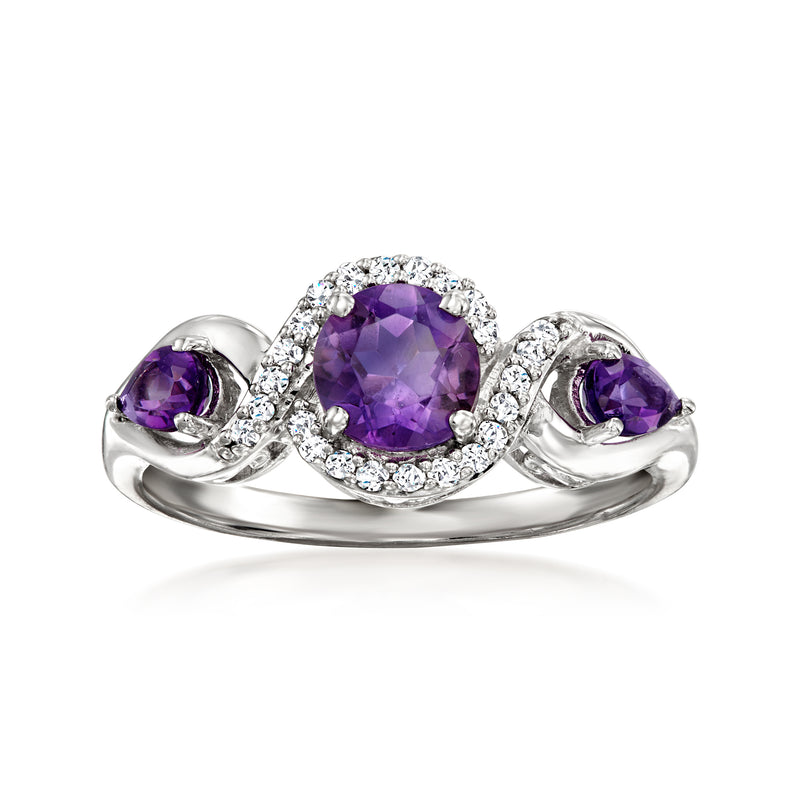 Sterling silver three-stone ring with oval amethyst center and two side amethyst stones