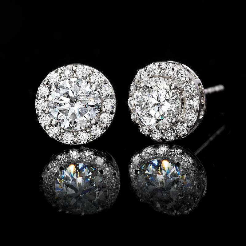 Round halo diamond stud earrings in white gold with detailed sparkle