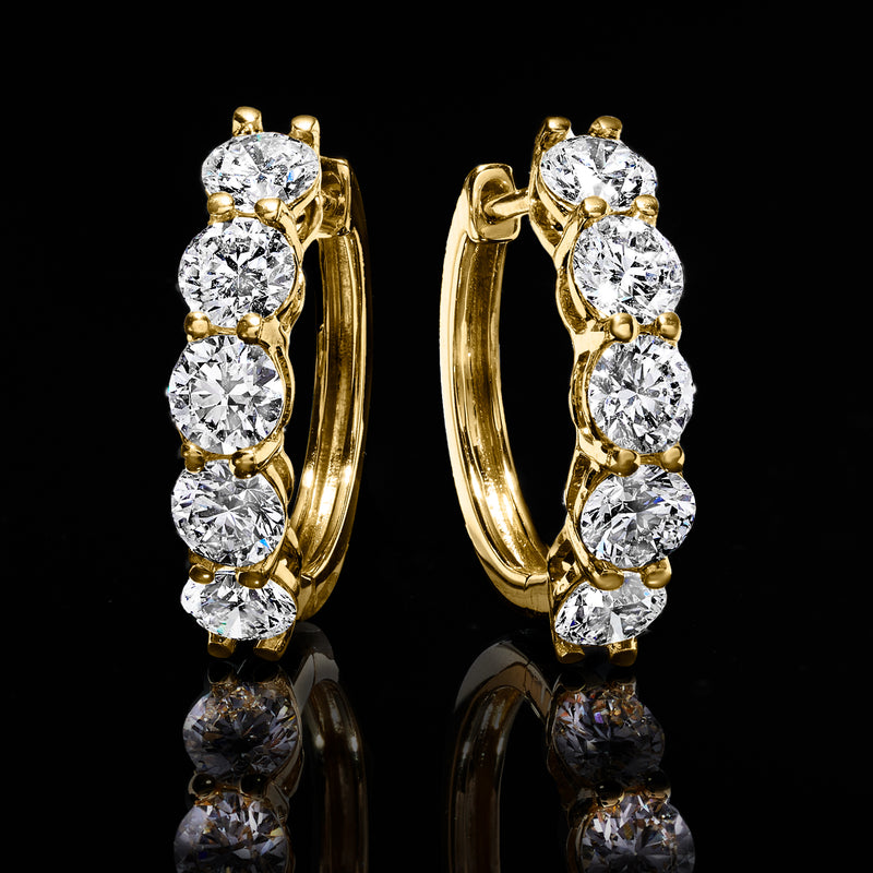 14kt yellow gold hoop earrings featuring five round diamonds on each hoop