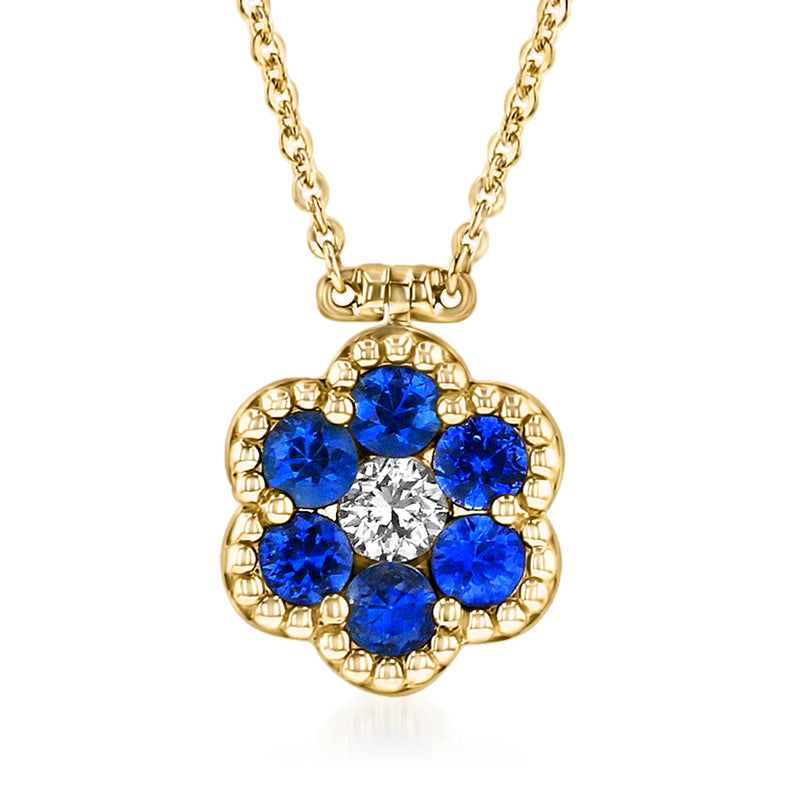 14kt yellow gold necklace with sapphire flower pendant and diamond center
