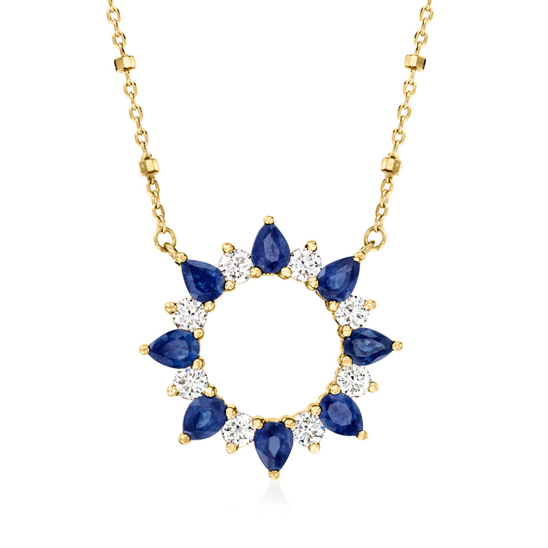 14kt yellow gold sun necklace with blue teardrop sapphires and white diamond accents
