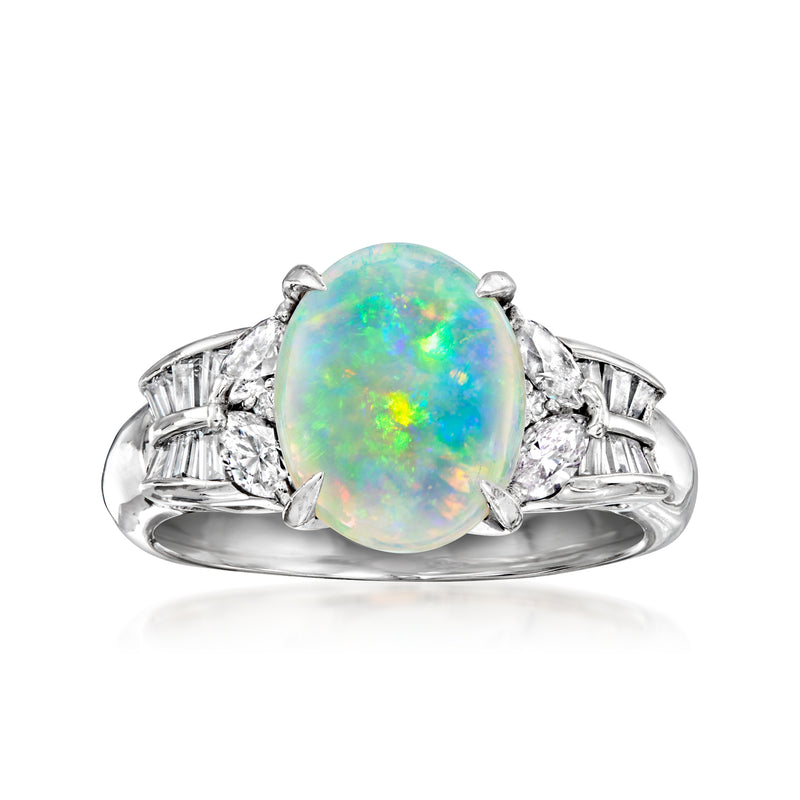 Platinum vintage ring with oval opal center and diamond accents on split shank