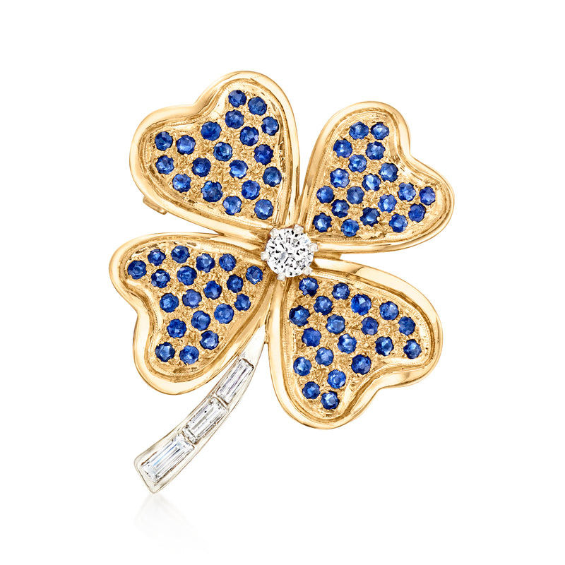 Two-tone gold four-leaf clover pin with blue sapphire petals and small diamond center