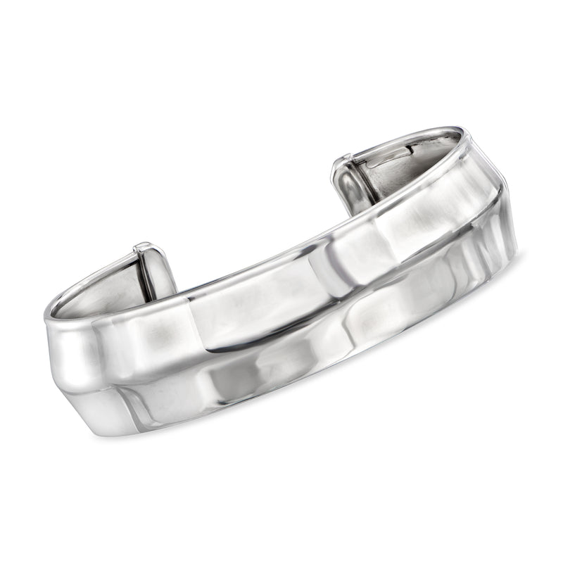 Sterling silver cuff bracelet with polished knife-edge design, wide hinged band