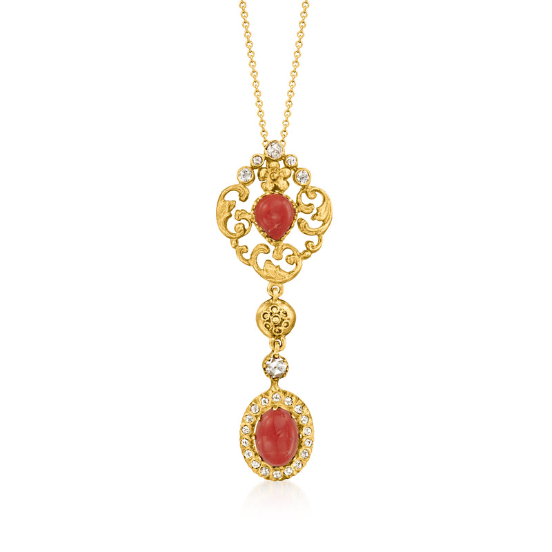 Yellow gold pendant necklace with red coral cabochon and diamond accents