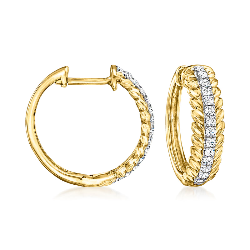 Gold hoop earrings with leaf-textured band and white diamond accents, hinged back