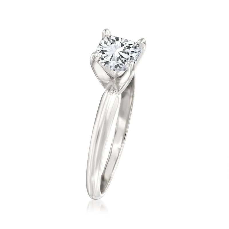 Diamond solitaire ring in 14kt white gold with round center stone, side view