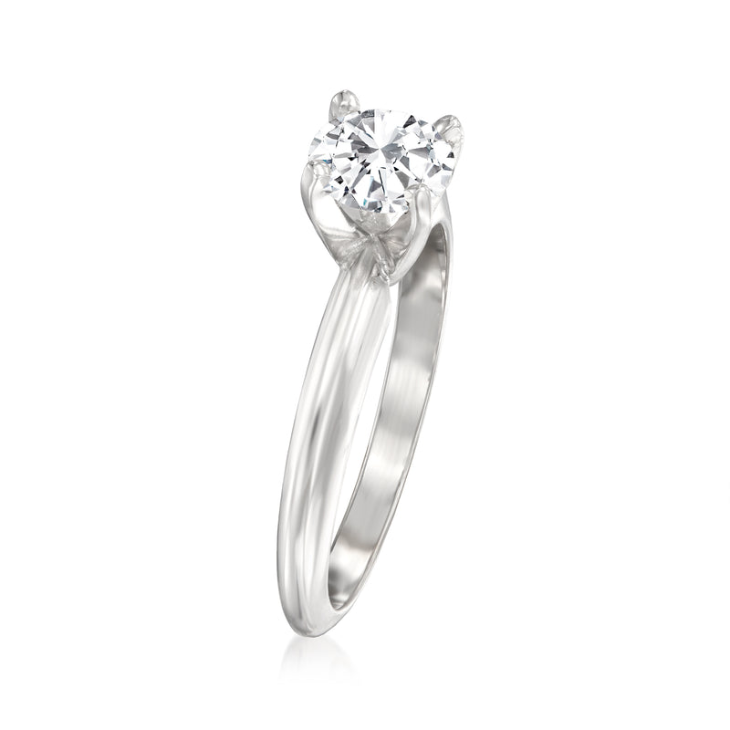 14kt white gold solitaire diamond ring angled view, round center diamond in prongs