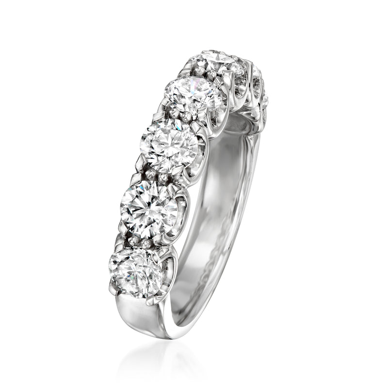 Diamond wedding band ring with large round stones in white gold, side view
