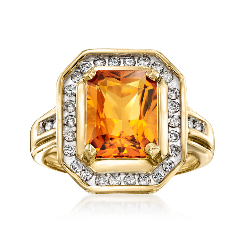 14kt yellow gold ring with square citrine center, diamond halo, and round diamond accents