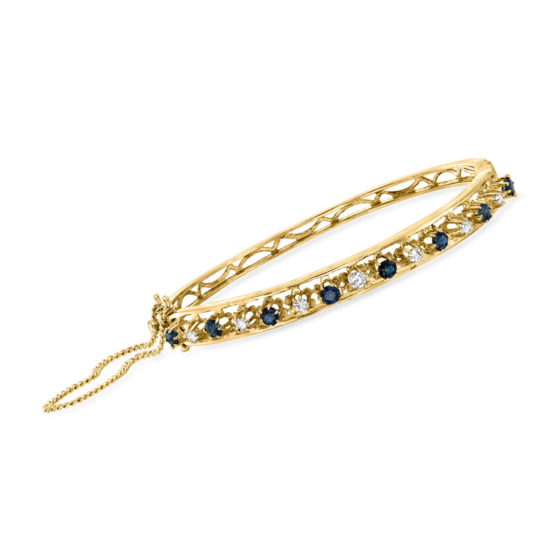 Vintage 14kt yellow gold bangle bracelet with blue sapphires and diamond accents