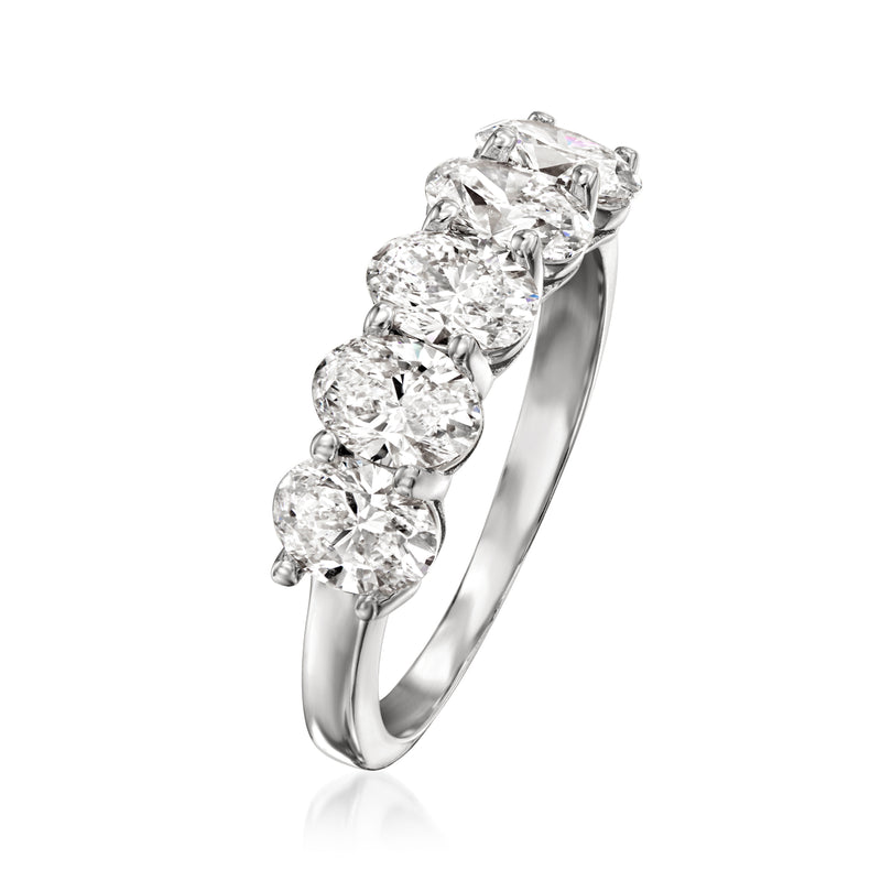 Five-stone diamond ring in 14kt white gold, side view of five round stones