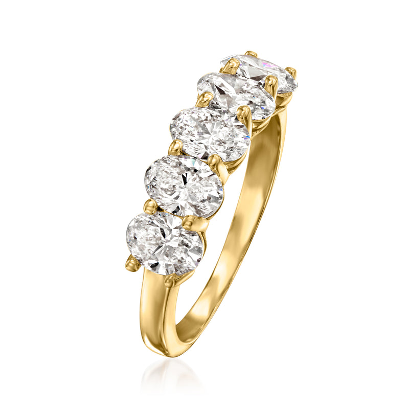 Five-stone diamond ring with yellow gold band and five round brilliant stones