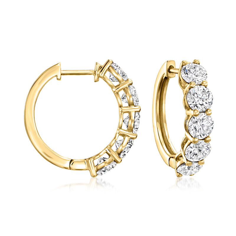 14kt yellow gold hoop earrings with five clear diamond stones in bar settings