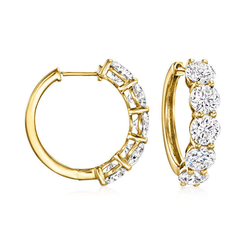 14kt yellow gold hoop earrings with five round diamonds in a five-stone setting
