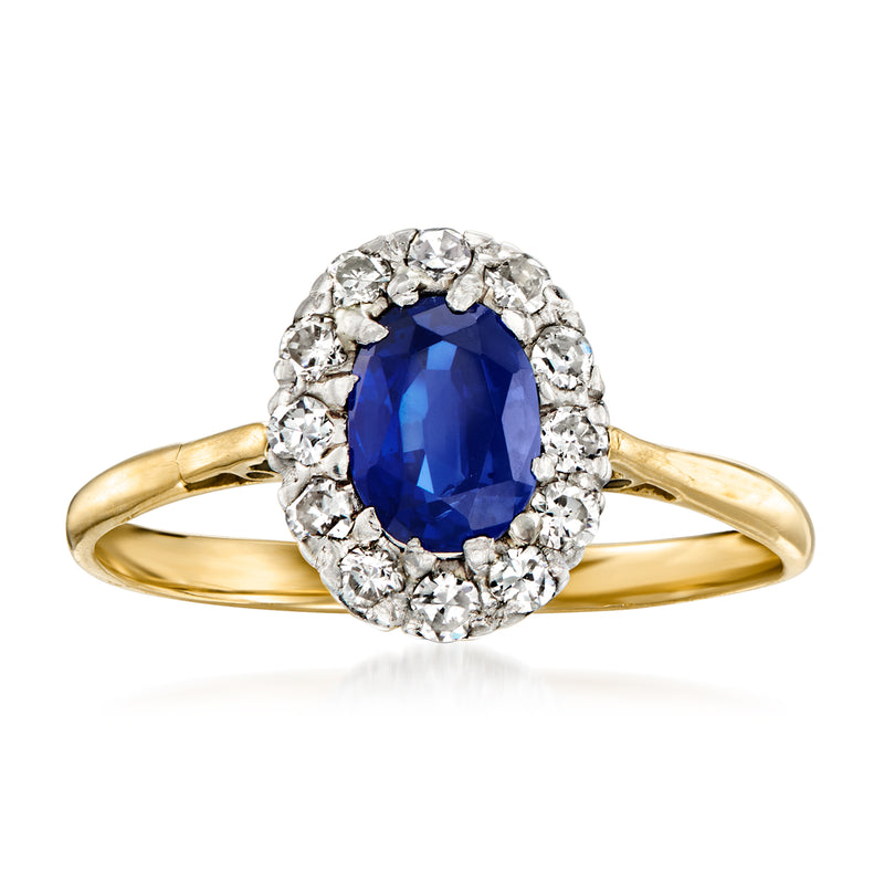 18k yellow gold ring with oval sapphire center and diamond halo, vintage style